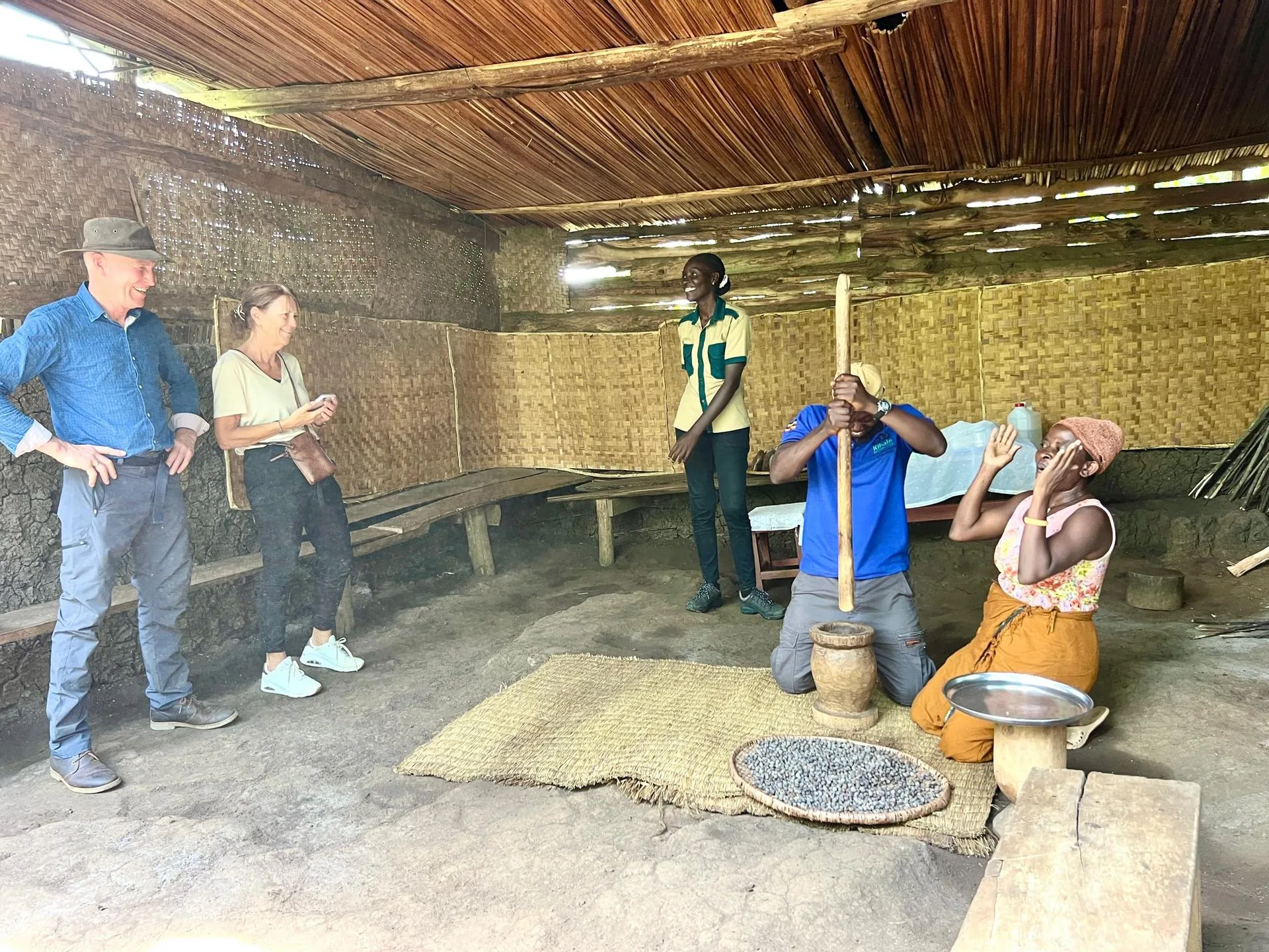 Community coffee demonstration near Kibale National Park
